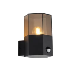 Buiten wandlamp zwart met smoke glas zeshoek en bewegingssensor - Denmark