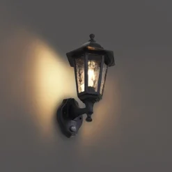 Buiten wandlamp zwart met bewegingssensor IP44 - New Haven Hammered