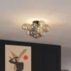 Design plafondlamp zwart met amber en smoke glas 4-lichts - Uvas