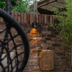 Moderne buiten wandlamp zwart kunststof ovaal - Baleno