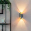 Moderne wandlamp zwart met gouden binnenkant - Faldo