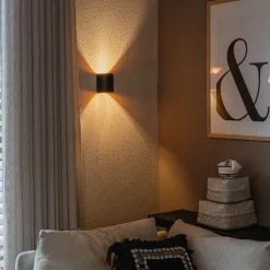 Moderne wandlamp zwart met messing - Sabbio